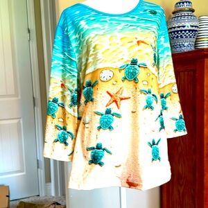 Long sleeve, 97% polyester,3% spandex.
Barely worn